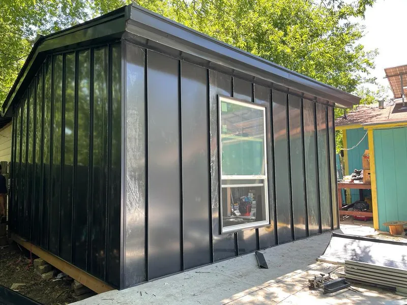 Black standing seam metal wall panels for Metal Roof Installation in Willoughby