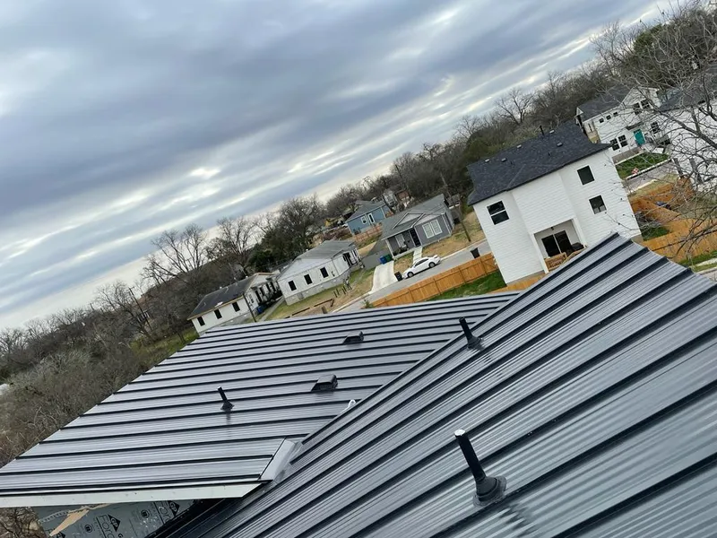 Standing seam metal roof panels with vents for Skylight Repair in Willoughby